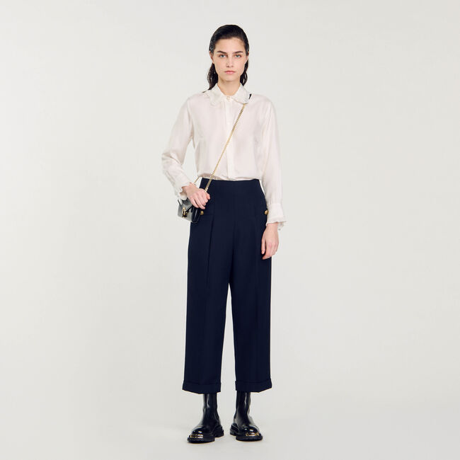 Pantalon de costume à plis