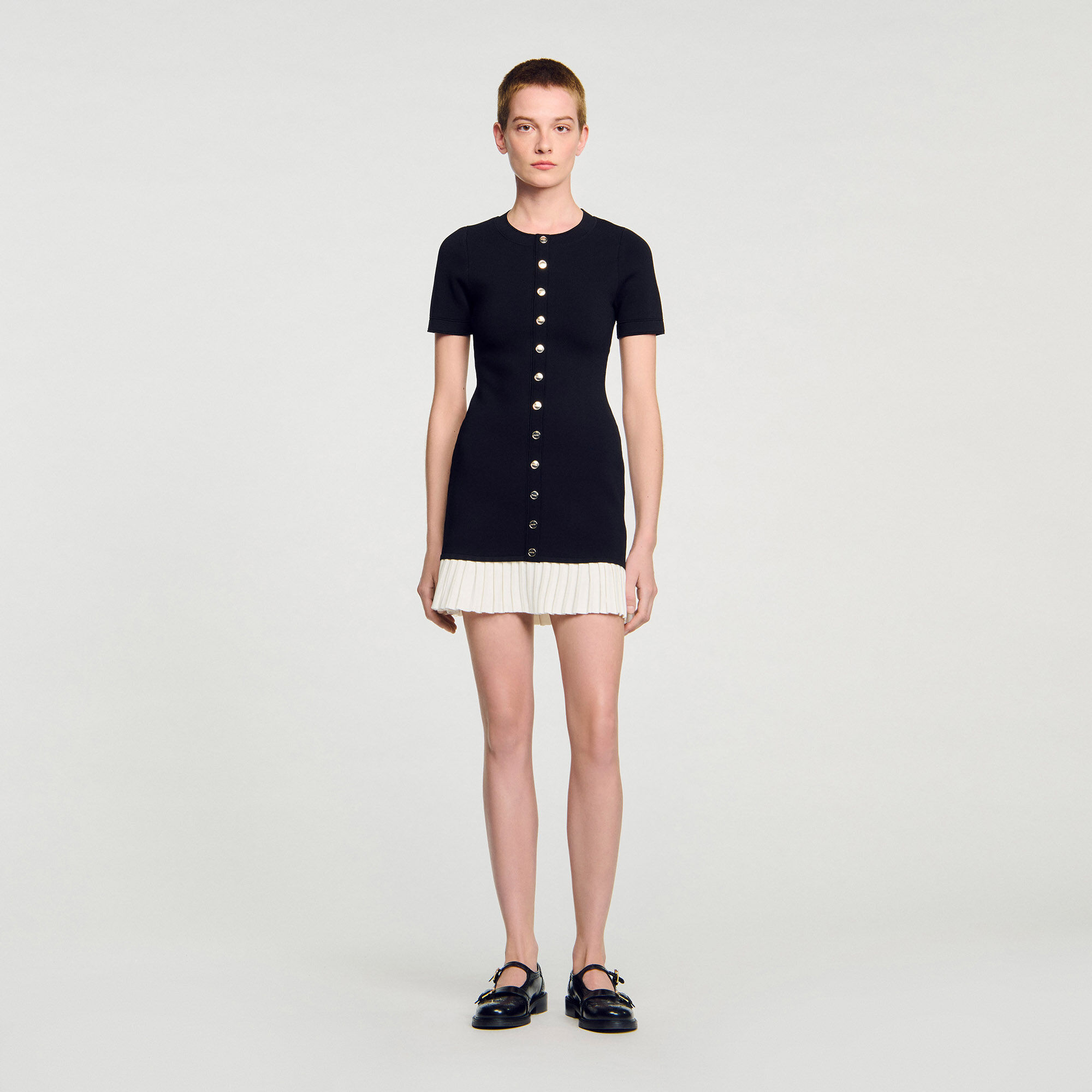 Robe courte en maille à volant
