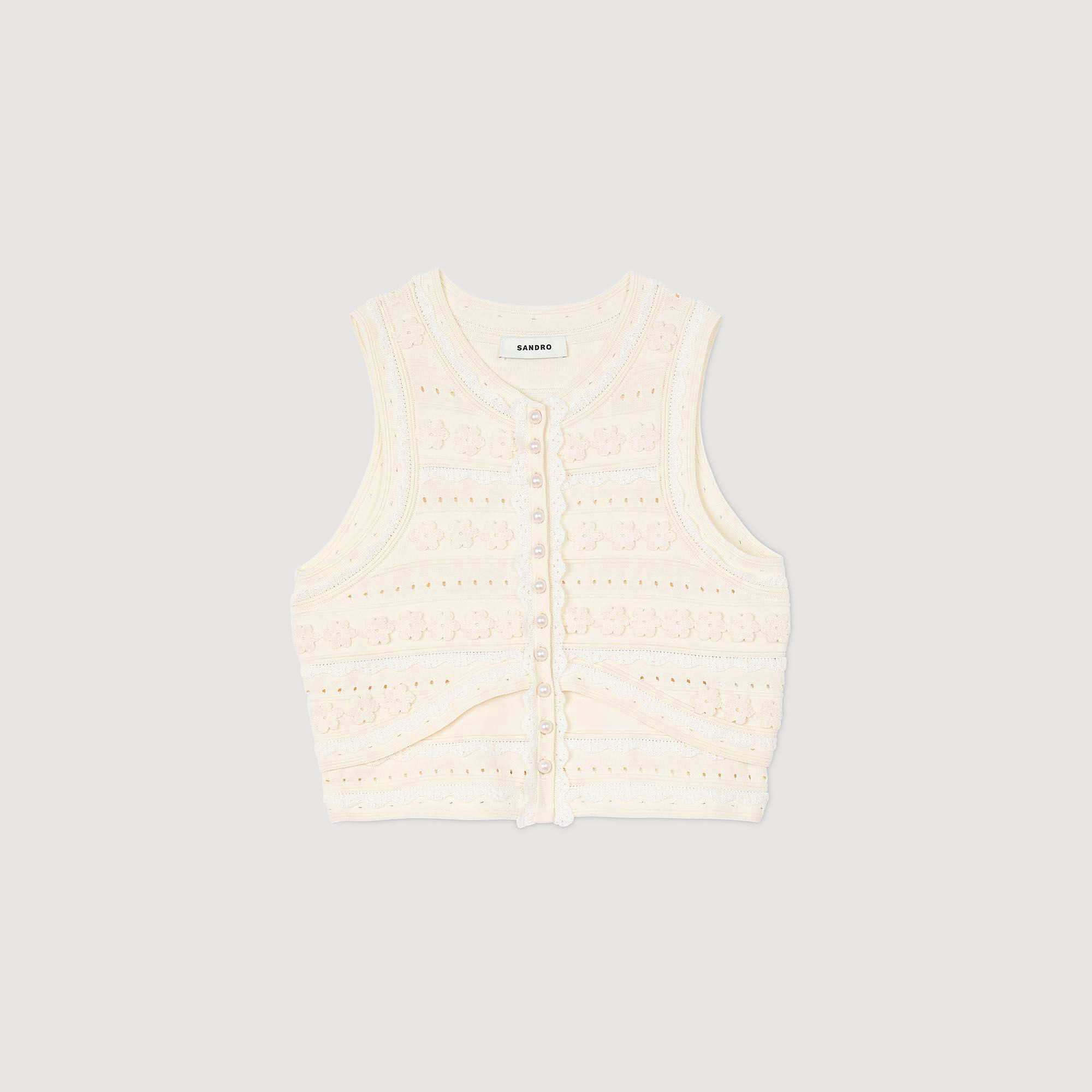 Pull court à détails crochetés