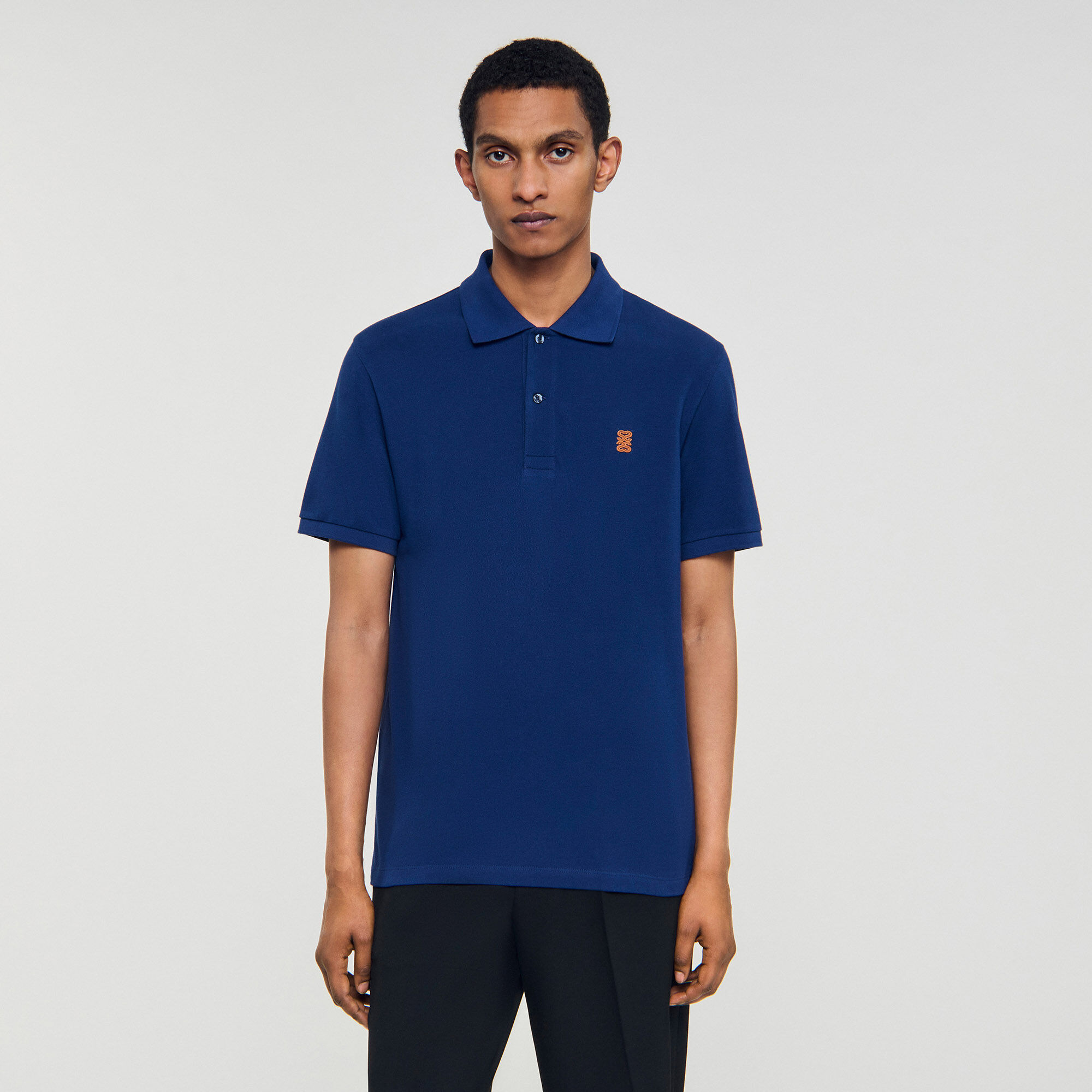 Polo à logo cuir