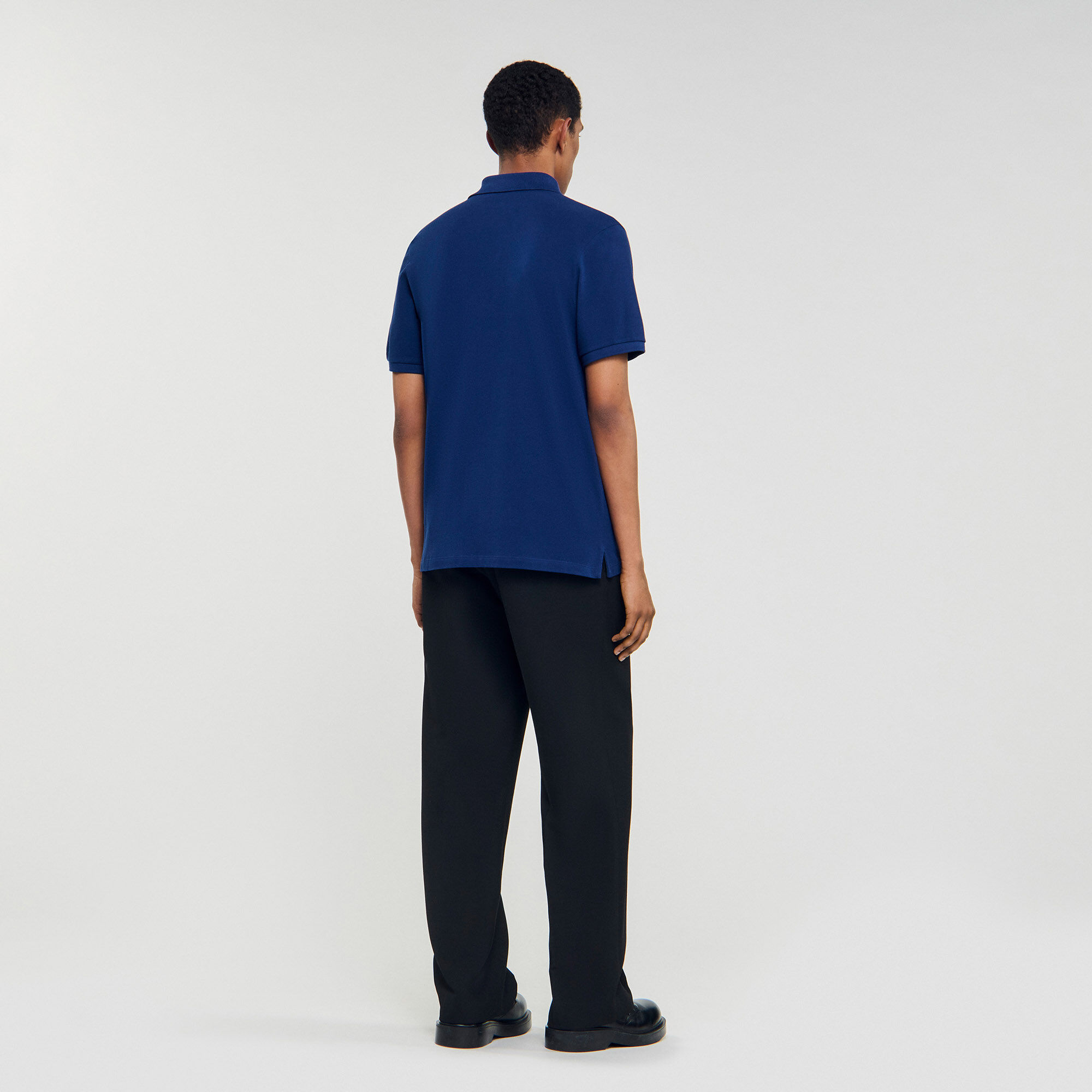 Polo à logo cuir