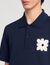 Polo à patch fleur