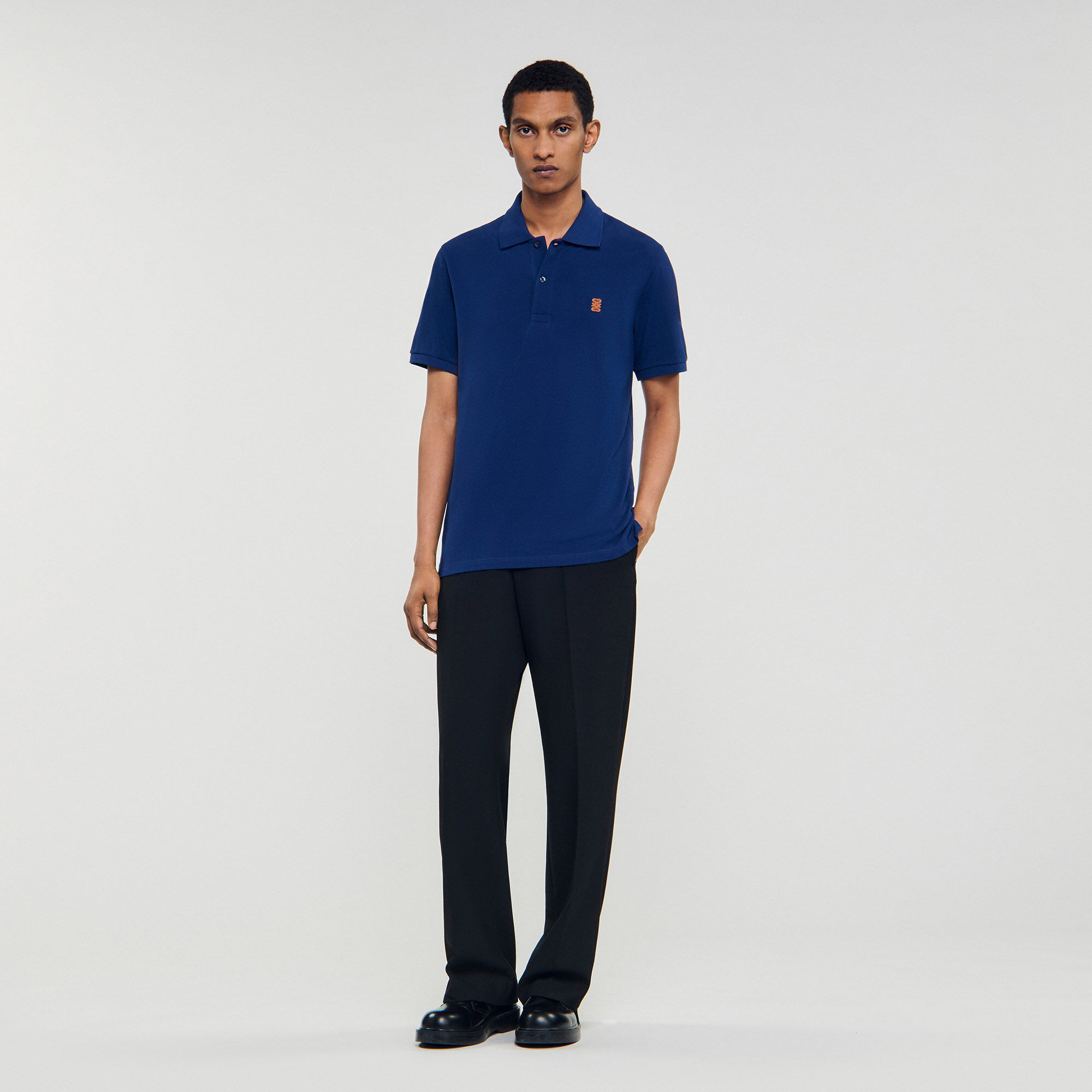 Polo à logo cuir
