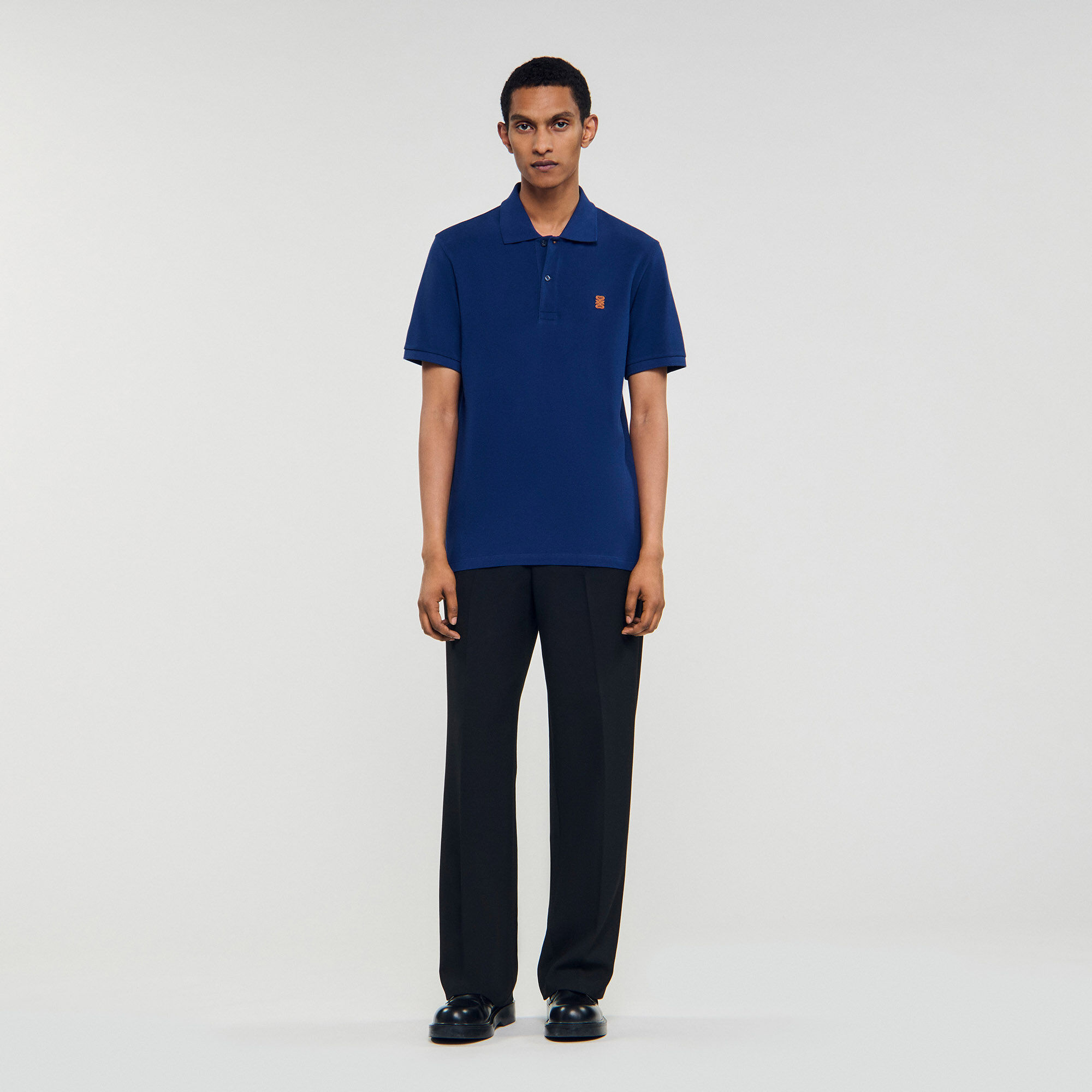 Polo à logo cuir